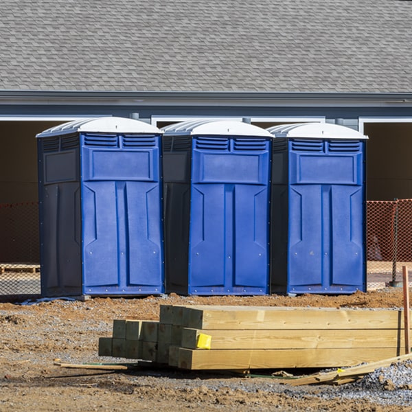 how often are the portable restrooms cleaned and serviced during a rental period in Durham